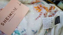 Load image into Gallery viewer, Shein Bae White Flowy Floral Tunic Top MD NWT
