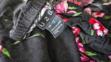 Load image into Gallery viewer, U2B Black Floral Strapless Hi Low Romper MD
