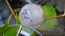 Load image into Gallery viewer, 1.5" Tourmaline Quartz Crystal Sphere with Glass Stand
