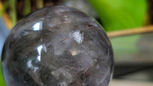 Load image into Gallery viewer, 2" Smokey Rainbow Fluorite Crystal Sphere with Stand
