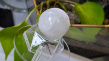 Load image into Gallery viewer, 1.5" Selenite Crystal Sphere with Plastic Stand
