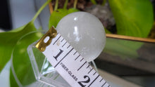 Load image into Gallery viewer, 1.5" Selenite Crystal Sphere with Plastic Stand
