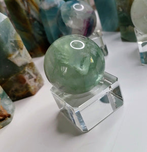 1-1.5" Rainbow Fluorite Sphere with Acrylic Stand