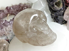 Load image into Gallery viewer, 2.5&quot; Sheen Smokey Quartz Rainbow Crystal Skull

