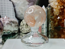 Load image into Gallery viewer, 2&quot; Rainbow Strawberry Quartz Crystal Sphere with Stand
